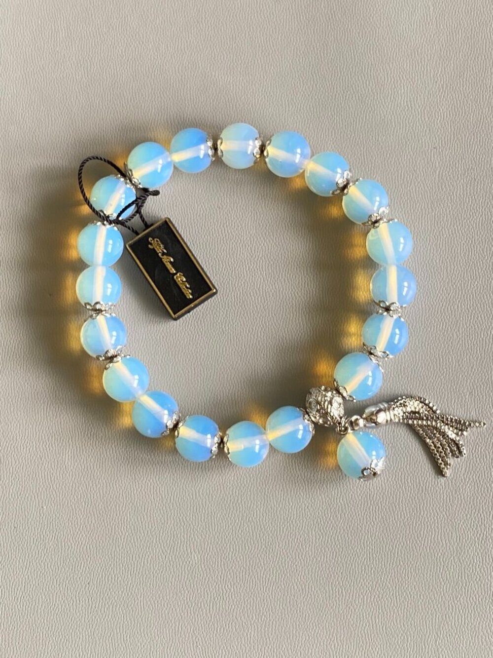 Fifth Avenue NWT Opalite Glass Beaded Stretch Bracelet Silver Filigree Tassel 8"